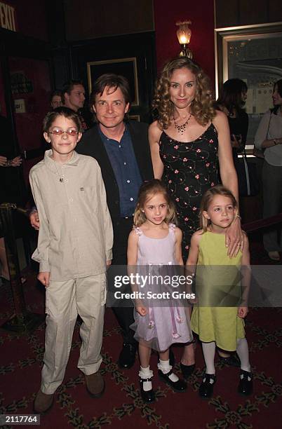 Actor Michael J. Fox arrives with his family, wife Tracy, son Sam, and twin daughters Schuyler and Aquinnah, at the New York premiere of the new...