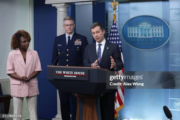 Secretary of Transportation Pete Buttigieg speaks as White House Press Secretary Karine Jean-Pierre and Deputy Commandant for Operations for the U.S....