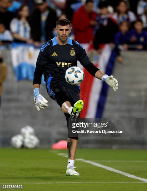 Goalkeeper Emiliano Martínez of Argentina warms up before a friendly soccer match against Costa Rica at United Airlines Field at the Los Angeles...