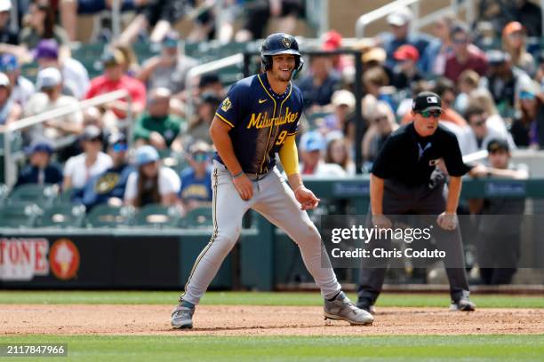 Brock Wilken of the Milwaukee Brewers leads off first base during a spring training game against the Colorado Rockies at Salt River Fields at Talking...
