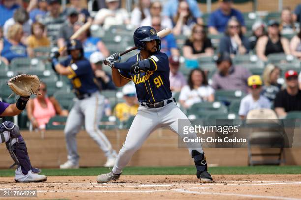 Eric Brown Jr. #91 of the Milwaukee Brewers bats during a spring training game against the Colorado Rockies at Salt River Fields at Talking Stick on...
