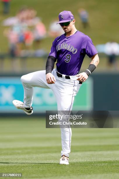 Brenton Doyle of the Colorado Rockies prepares for a spring training game against the Milwaukee Brewers at Salt River Fields at Talking Stick on...