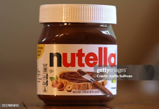 In this photo illustration, a container of Nutella hazelnut spread made by the Ferrero company is displayed on March 27, 2024 in San Anselmo,...