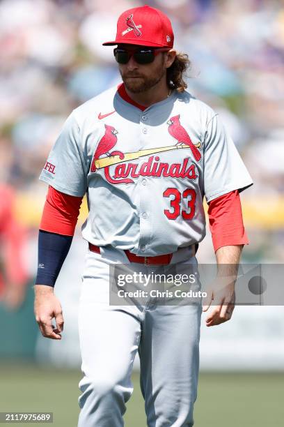 Brendan Donovan of the St. Louis Cardinals warms up before a spring training game against the Chicago Cubs at Sloan Park on March 25, 2024 in Mesa,...