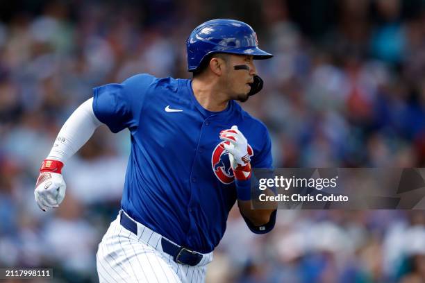 Seiya Suzuki of the Chicago Cubs runs the bases after hitting a home run during a spring training game against the St. Louis Cardinals at Sloan Park...