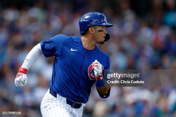 Seiya Suzuki of the Chicago Cubs runs the bases after hitting a home run during a spring training game against the St. Louis Cardinals at Sloan Park...