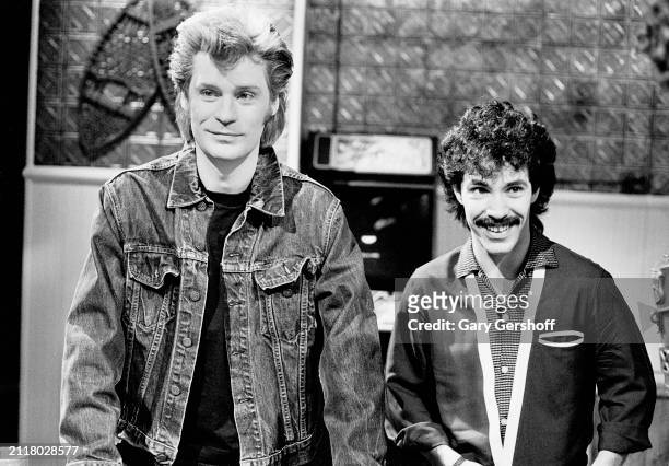 View of American Pop musicians Daryl Hall and John Oates, both of the duo Hall & Oates, during an interview on MTV at Teletronic Studios, New York,...