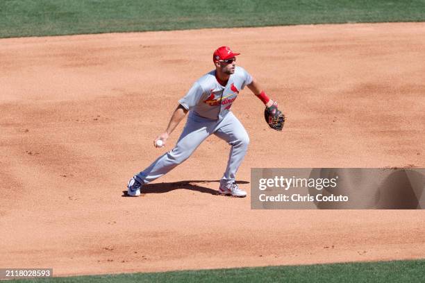 Paul Goldschmidt of the St. Louis Cardinals fields a ground ball during a spring training game against the Chicago Cubs at Sloan Park on March 25,...