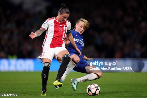 Sherida Spitse of Ajax is challenged by Aggie Beever-Jones of Chelsea during the UEFA Women's Champions League 2023/24 Quarter Final Leg Two match...
