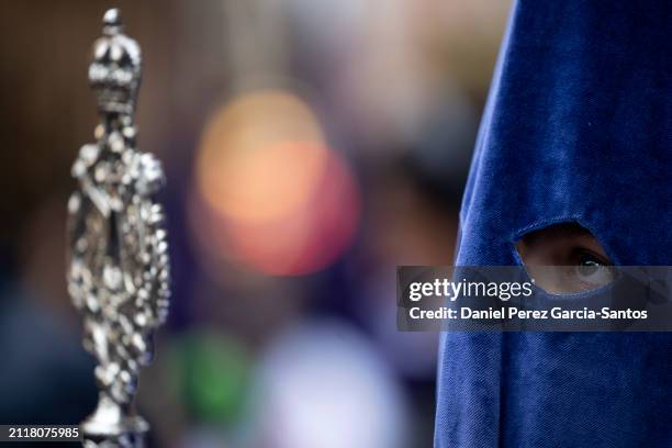 Penitents take part in the Rico brotherhood procession during Holy Week on March 27, 2024 in Malaga, Spain. Holy Week, known locally as Semana Santa,...