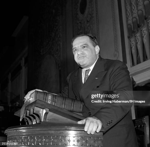 American-Italian mayor of New York City Fiorello La Guardia speaks at the pulpit in church in New York, New York, circa 1940.