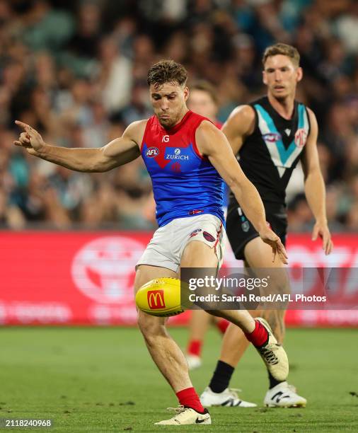 Jack Viney of the Demons kicks a goal during the 2024 AFL Round 03 match between the Port Adelaide Power and the Melbourne Demons at Adelaide Oval on...