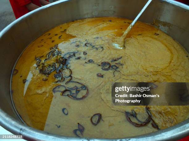 variety of foods being prepared and sold by different stalls - aloo tikki stock pictures, royalty-free photos & images