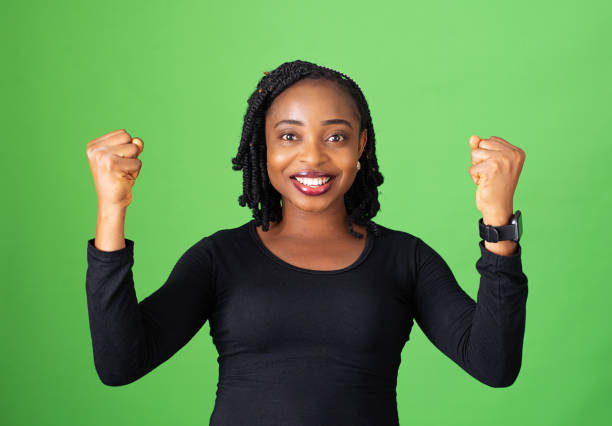 portrait expressions on a green isolated background - happy black mab stock pictures, royalty-free photos & images