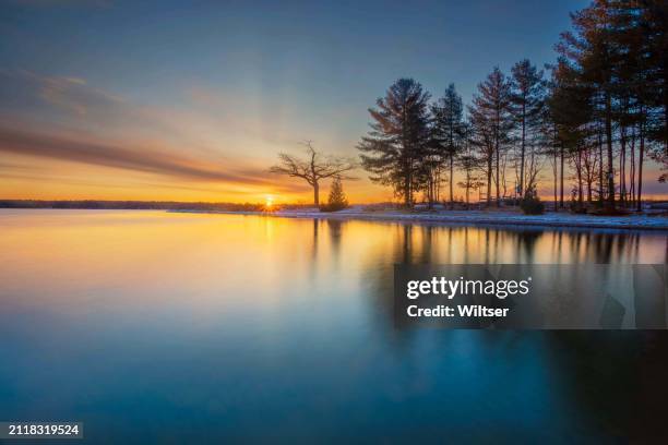 detroit point tranquil spring sunrise - michigan nature stock pictures, royalty-free photos & images