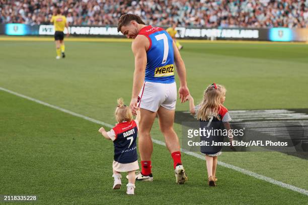 Jack Viney of the Demons celebrates his 250th game during the 2024 AFL Round 03 match between the Port Adelaide Power and the Melbourne Demons at...