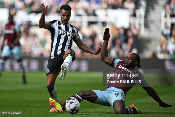 West Ham United's English midfielder Michail Antonio vies with Newcastle United's English midfielder Jacob Murphy during the English Premier League...