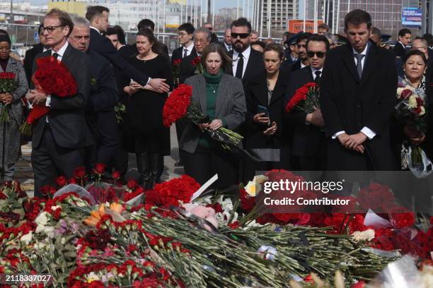 Ambassador in Russia Lynne M. Tracy and other foreign ambassadors place flowers at a victim's memorial near Crocus City Hall, March 30, 2024 in...