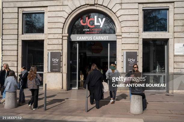 Students in front of the entrance to the University Lyon Catholic UCLY on the Carnot campus in Lyon, France on 25 March 2024.