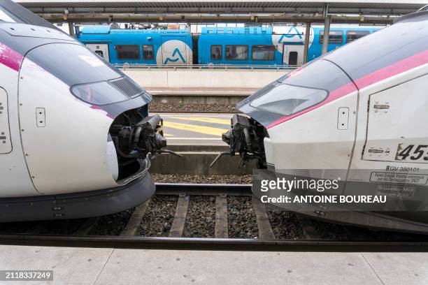 Automatic coupling operation enabling 2 TGV high-speed trains to couple up, seen from the platform of Part-Dieu station in Lyon, France, on 21...