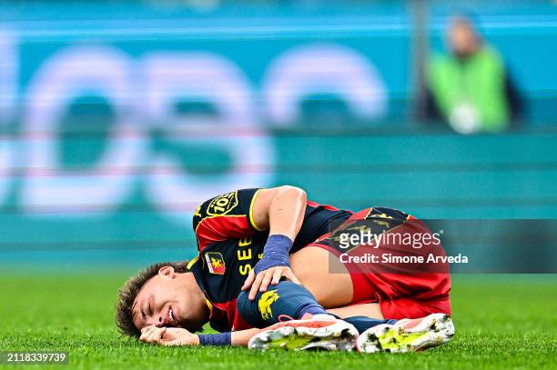 Mateo Retegui of Genoa lies on the pitch after suffering an injury during the Serie A TIM match between Genoa CFC and Frosinone Calcio at Stadio...