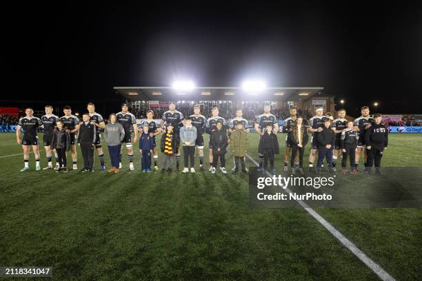 Players from the Falcons are lining up with mascots before the Gallagher Premiership match between Newcastle Falcons and Leicester Tigers at Kingston...