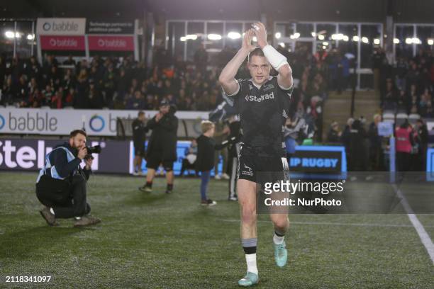 Tom Penny is applauding the crowd as he enters the field for his 100th game for the Newcastle Falcons before the Gallagher Premiership match between...