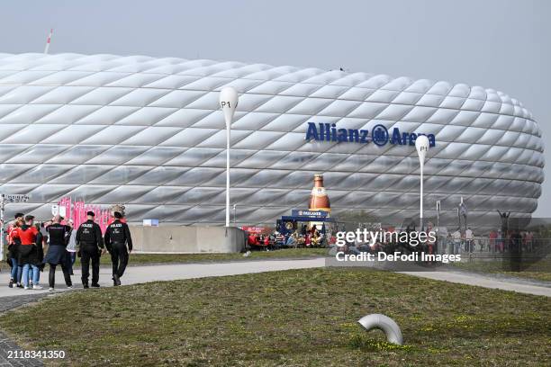 Police officers in front of the Allianz Arena prior to the Bundesliga match between FC Bayern München and Borussia Dortmund at Allianz Arena on March...