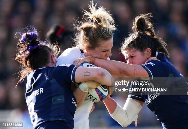 France's number 8 Romane Menager fights for the ball during the Six Nations international women's rugby union match between Scotland and France at...