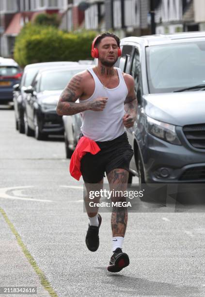 Stephen Bear is seen out for a run on March 29, 2024 in London, United Kingdom.