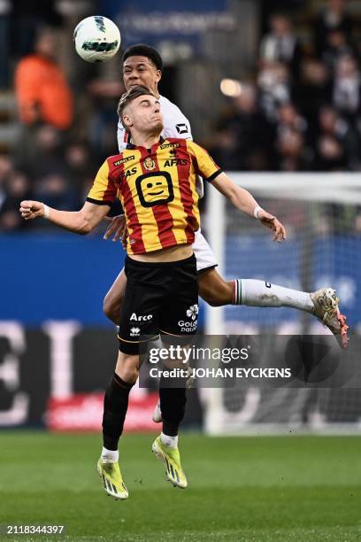 S Joel Schingtienne and Mechelen's Norman Bassette fight for the ball during a soccer match between Oud-Heverlee Leuven and KV Mechelen, Saturday 30...