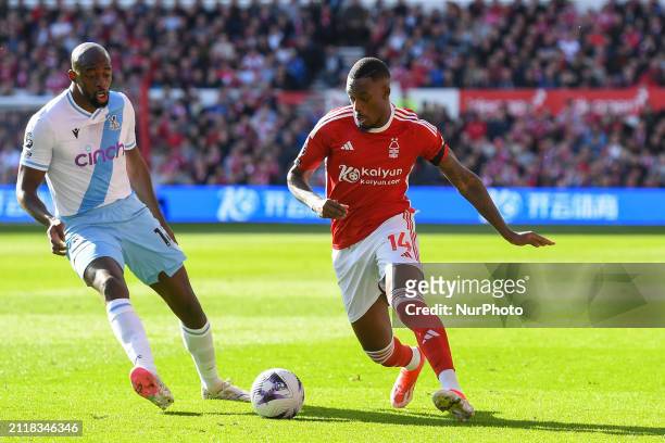 Callum Hudson-Odoi of Nottingham Forest is under pressure from Jean-Philippe Mateta of Crystal Palace during the Premier League match between...