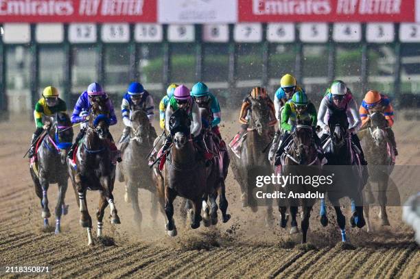 Riders compete for the 2000-meter race within the 2024 Dubai World Cup at Meydan Racecourse in Dubai, United Arab Emirates on March 30, 2024.