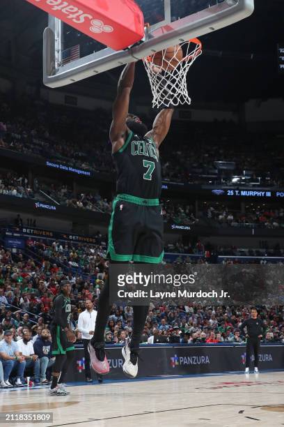 Jaylen Brown of the Boston Celtics dunks the ball during the game against the New Orleans Pelicans on March 30, 2024 at the Smoothie King Center in...