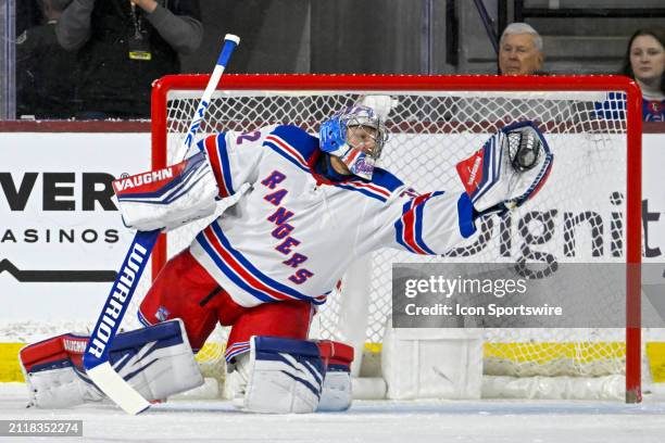 New York Rangers Goalie Jonathan Quick makes a glove save during the first period of an NHL game between the Arizona Coyotes and New York Rangers on...