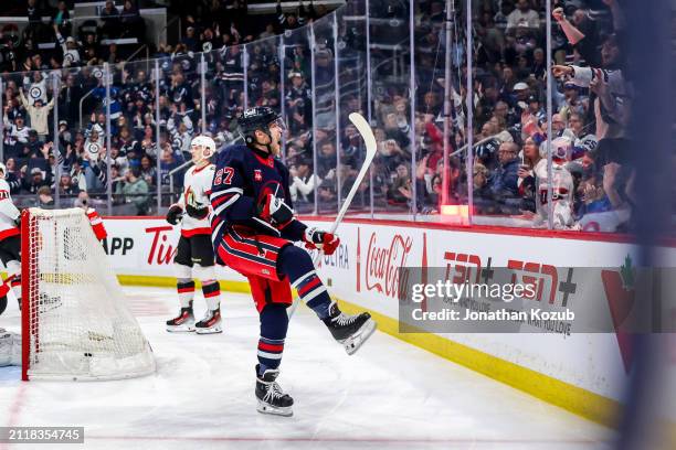 Nikolaj Ehlers of the Winnipeg Jets celebrates after scoring a second period goal against the Ottawa Senators at the Canada Life Centre on March 30,...