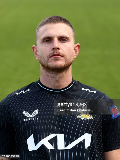Conor McKerr of Surrey poses for a portrait during the Surrey CCC photocall at The Kia Oval on March 27, 2024 in London, England.