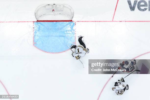 Michael Sgarbossa of the Washington Capitals scored a goal against Jeremy Swayman of the Boston Bruins at Capital One Arena on March 30, 2024 in...