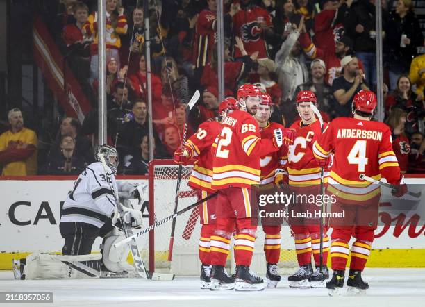 Blake Coleman of the Calgary Flames celebrates his second period goal with teammates against the Los Angeles Kings at the Scotiabank Saddledome on...