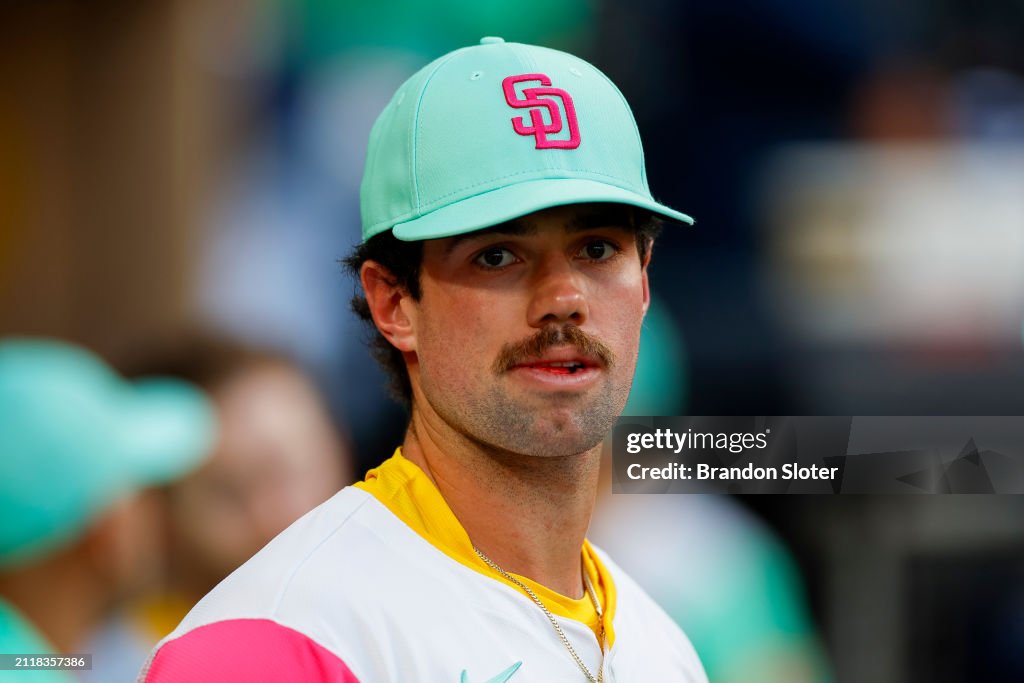 Graham Prior Graham Pauley of the San Diego Padres looks on in the dugout prior to ...