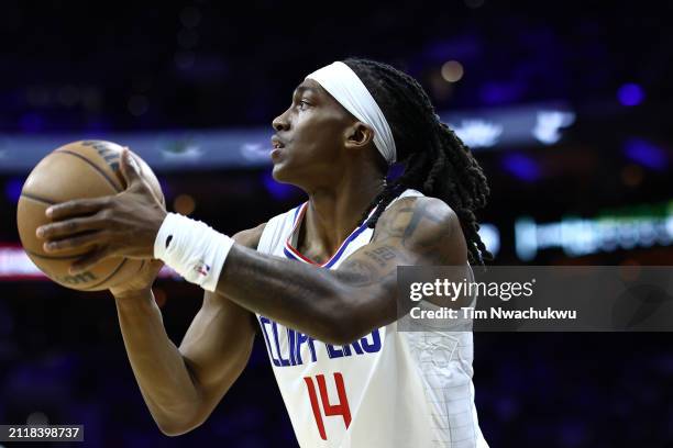 Terance Mann of the LA Clippers shoots during the first quarter against the Philadelphia 76ersat the Wells Fargo Center on March 27, 2024 in...