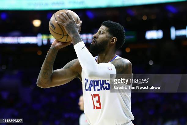 Paul George of the LA Clippers shoots during the first quarter against the Philadelphia 76ers at the Wells Fargo Center on March 27, 2024 in...
