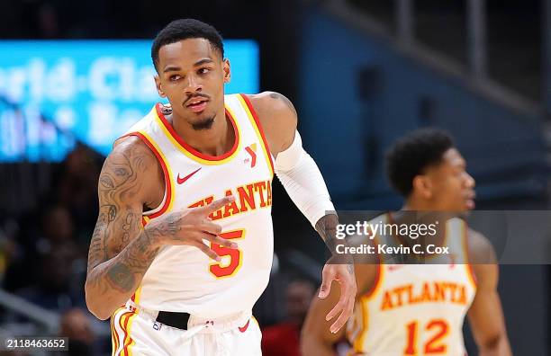 Dejounte Murray of the Atlanta Hawks reacts after hitting a three-point basket against the Portland Trail Blazers during the first quarter at State...