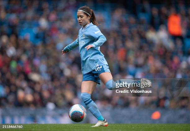 Yui Hasegawa of Manchester City in action during the Barclays Women's Super League match between Manchester City and Manchester United at Etihad...