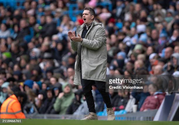 Marc Skinner, Manager of Manchester United, gives the team instructions during the Barclays Women's Super League match between Manchester City and...