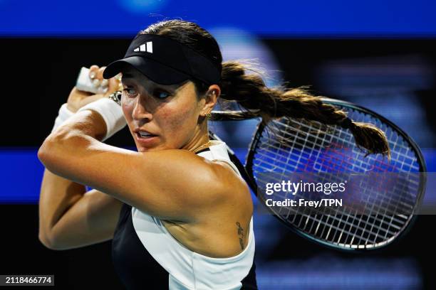 Jessica Pegula of the United States hits a backhand against Ekaterina Alexandrova of Russiain in the quarterfinals of the Miami Open at the Hard Rock...