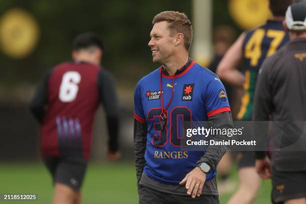 Sam Mitchell, Senior Coach of the Hawks reacts during a Hawthorn Hawks AFL training session at Waverley Park on March 28, 2024 in Melbourne,...