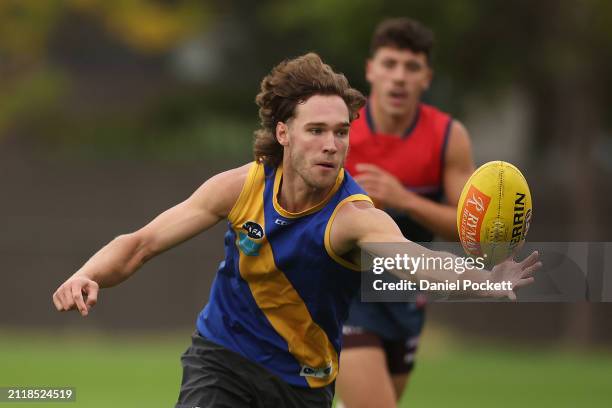 Jack Scrimshaw of the Hawks in action during a Hawthorn Hawks AFL training session at Waverley Park on March 28, 2024 in Melbourne, Australia.