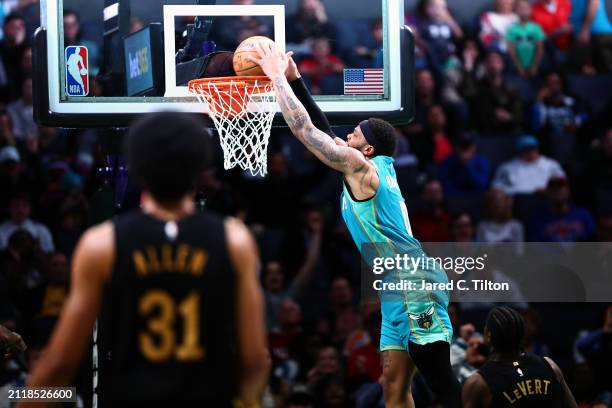 Miles Bridges of the Charlotte Hornets dunks the ball during the second half of the game against the Cleveland Cavaliers at Spectrum Center on March...