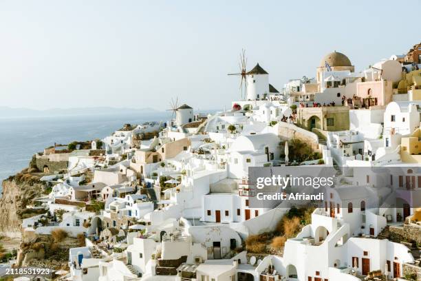 beautiful landscape of oia, santorini, greece - mediterranean-blue-roof-santorini stock pictures, royalty-free photos & images